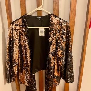 Torrid Multi color sequence open front blazer size 00/0 (10/12)—Never been worn